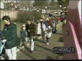 Jim, Layna, and neighbors in the park